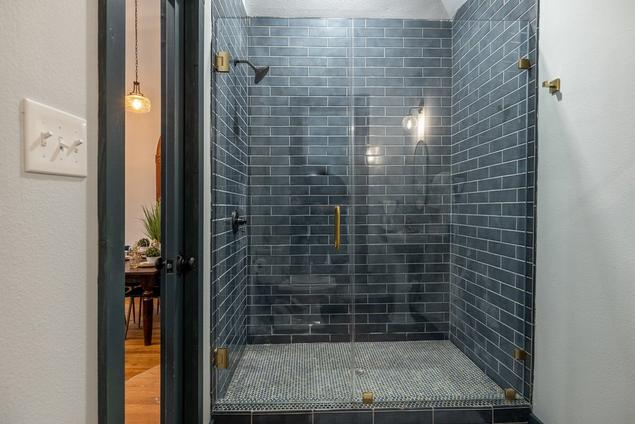 Blue subway tile bathroom
